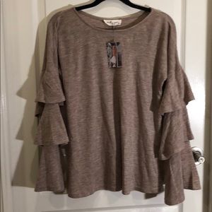 Tan ruffle sleeved blouse by Molly Green